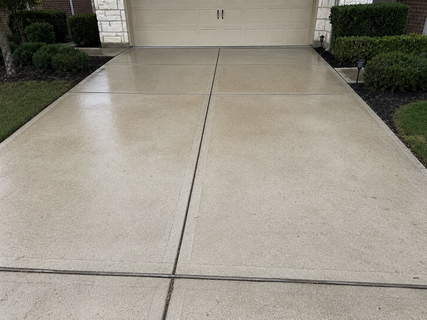 Driveway after — pressure washed clean
